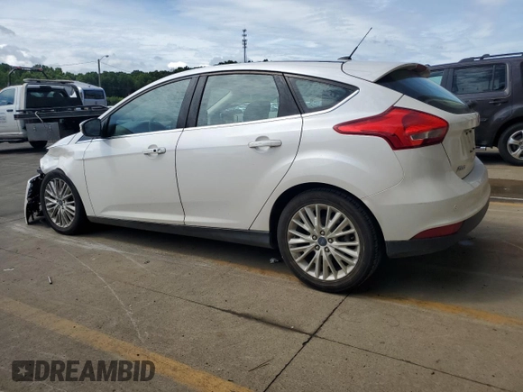 2017 Ford Focus Titanium with VIN 1FADP3N24HL206365, listed as a Copart auction lot 63199965 with 51,435 mi miles and Salvage title. Bid and sale history available at DreamBid. Image 2.
