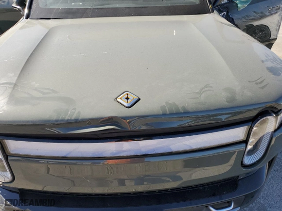 2022 Rivian R1S Launch Edition with VIN 7PDSGABL6NN000590, listed as a Copart auction lot 61510904 with 0 mi miles and Salvage Title. Bid and sale history available at carsss.com. Image 12.