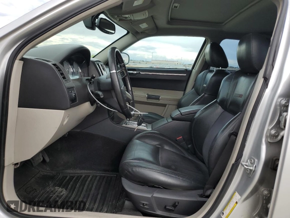 2007 Chrysler 300 C SRT8 with VIN 2C3LA73W07H660214, listed as a Copart auction lot 70283834 with 249,130 mi miles and Salvage Title. Bid and sale history available at carsss.com. Image 7.