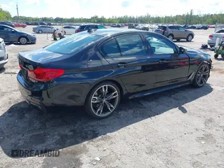 2019 BMW 5 Series M550i xDrive with VIN WBAJB9C51KB289355, listed as a IAAI auction lot 41867984 with 30,106 mi miles and . Bid and sale history available at DreamBid. Image 4.