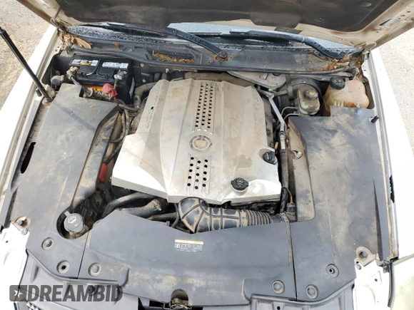 2008 Cadillac STS RWD z VIN 1G6DZ67A280195039, wystawiony jako Copart lot #81965734 z przebiegiem 133 334 mil mil oraz Szkoda całkowita • Salvage title. Historia ofert i sprzedaży dostępna na DreamBid. Obrazek 11.