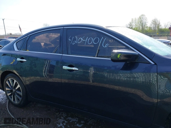 2016 Nissan Altima SR with VIN 1N4AL3AP1GC204703, listed as a IAAI auction lot 42040016 with 88,304 mi miles and . Bid and sale history available at DreamBid. Image 13.