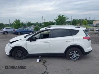 2018 Toyota RAV4 LE with VIN JTMBFREV6JJ210226, listed as a IAAI auction lot 42700312 with Not provided miles and . Bid and sale history available at DreamBid. Image 15.