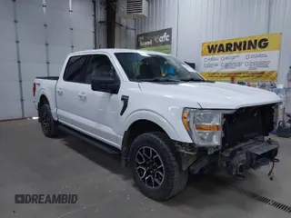 2021 Ford F-150 XL with VIN 1FTFW1E82MFA17480, listed as a IAAI auction lot 42063471 with 83,446 mi miles. Bid and sale history available at carsss.com. Image 1.
