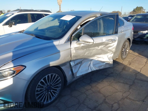 2017 Ford Fusion Hybrid Titanium with VIN 3FA6P0RU8HR190482, listed as a IAAI auction lot 41322244 with 137,539 mi miles and . Bid and sale history available at DreamBid. Image 6.