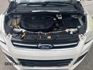 2014 Ford Escape Titanium with VIN 1FMCU9J94EUC63638, listed as a IAAI auction lot 42196241 with 198,112 mi miles and . Bid and sale history available at DreamBid. Image 10.