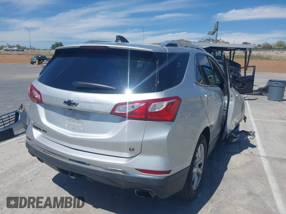 2020 Chevrolet Equinox LT with VIN 3GNAXLEX2LS609943, listed as a IAAI auction lot 42014464 with 80,942 mi miles. Bid and sale history available at carsss.com. Image 4.