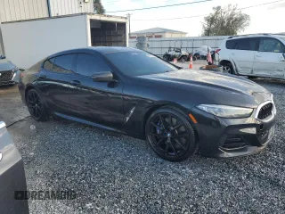 2023 BMW 8 Series M850i with VIN WBAGV8C02PCK67527, listed as a Copart auction lot 80470154 with 17,873 mi miles and Salvage Title. Bid and sale history available at carsss.com. Image 4.