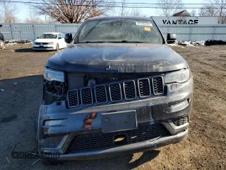 2018 Jeep Grand Cherokee High Altitude with VIN 1C4RJFCG3JC488022, listed as a Copart auction lot 87700385 with 94,390 mi miles and Salvage title. Bid and sale history available at DreamBid. Image 5.