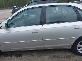 2002 Toyota Avalon XL with VIN 4T1BF28B82U240087, listed as a IAAI auction lot 41699355 with 263,253 mi miles. Bid and sale history available at carsss.com. Image 14.