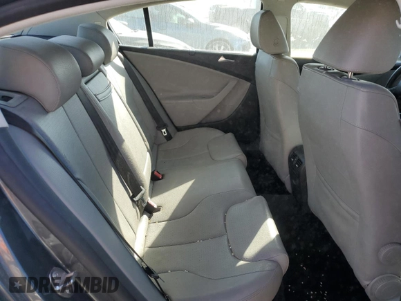 2009 Volkswagen Passat Komfort z VIN WVWJK73C49P049140, wystawiony jako Copart lot #53472005 z przebiegiem 193 458 mil mil oraz Szkoda całkowita • Salvage title. Historia ofert i sprzedaży dostępna na DreamBid. Obrazek 10.