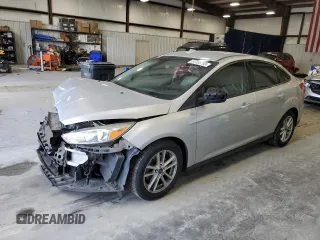 2018 Ford Focus SE z VIN 1FADP3FE9JL234158, wystawiony jako Copart lot #51788755 z przebiegiem 99 877 mil mil oraz Szkody całkowita. Historia ofert i sprzedaży dostępna na DreamBid. Obrazek 1.