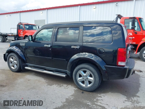 2007 Dodge Nitro SLT with VIN 1D8GU58K97W679278, listed as a IAAI auction lot 42014211 with 213,451 mi miles and . Bid and sale history available at carsss.com. Image 14.