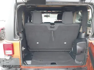 2011 Jeep Wrangler Sport with VIN 1J4AA2D16BL589390, listed as a IAAI auction lot 41478801 with 153,013 mi miles. Bid and sale history available at carsss.com. Image 17.