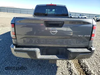 2024 Nissan Frontier SV z VIN 1N6ED1FK2RN604834, wystawiony jako Copart lot #76751104 z przebiegiem 7 788 mil mil oraz Szkoda całkowita • Salvage title. Historia ofert i sprzedaży dostępna na DreamBid. Obrazek 6.
