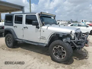 2012 Jeep Wrangler Unlimited Sport z VIN 1C4BJWDG8CL220960, wystawiony jako Copart lot #57823315 z przebiegiem 177 541 mil mil oraz Szkoda całkowita • Salvage title. Historia ofert i sprzedaży dostępna na DreamBid. Obrazek 4.