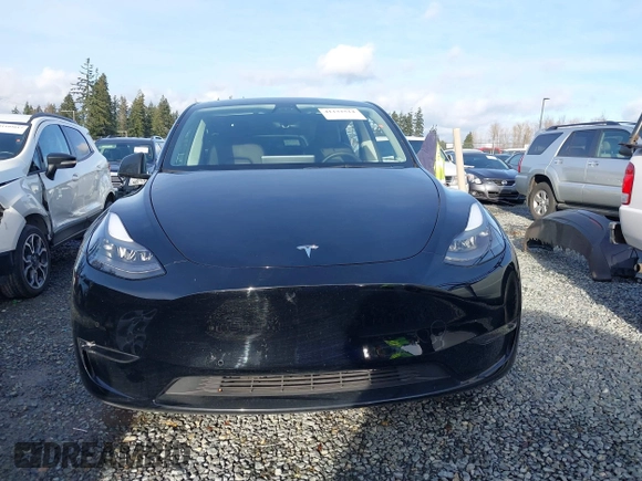 2022 Tesla Model Y Performance with VIN 7SAYGDEF0NF406262, listed as a IAAI auction lot 41132514 with 27,171 mi miles. Bid and sale history available at carsss.com. Image 13.