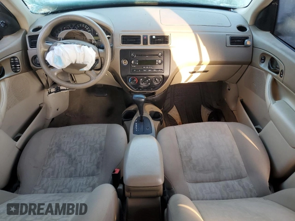 2005 Ford Focus S with VIN 1FAFP34N65W240449, listed as a Copart auction lot 52457395 with 140,246 mi miles and Non Repairable. Bid and sale history available at DreamBid. Image 8.