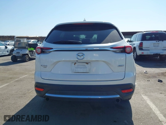 2017 Mazda CX-9 Grand Touring with VIN JM3TCBDY3H0132351, listed as a IAAI auction lot 42346910 with 124,990 mi miles and . Bid and sale history available at DreamBid. Image 16.