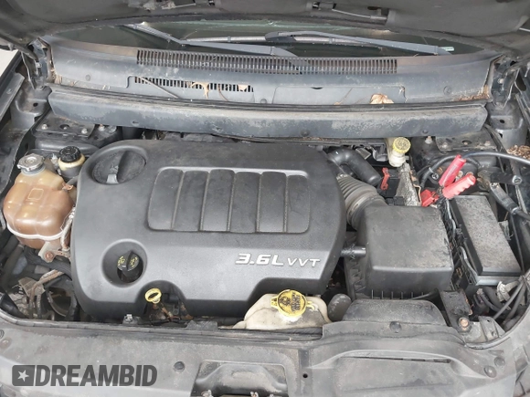 2013 Dodge Journey SXT with VIN 3C4PDDBG0DT660956, listed as a IAAI auction lot 41593385 with 196,021 mi miles and . Bid and sale history available at DreamBid. Image 10.