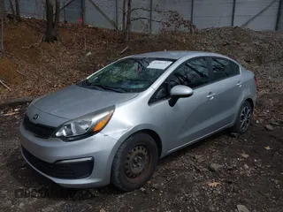 2017 Kia Rio LX with VIN KNADM4A37H6100379, listed as a IAAI auction lot 41942737 with 128,858 mi miles. Bid and sale history available at carsss.com. Image 2.