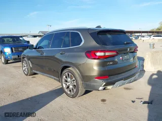 2023 BMW X5 sDrive40i with VIN 5UXCR4C02P9S02333, listed as a IAAI auction lot 41219318 with 32,966 mi miles. Bid and sale history available at carsss.com. Image 3.