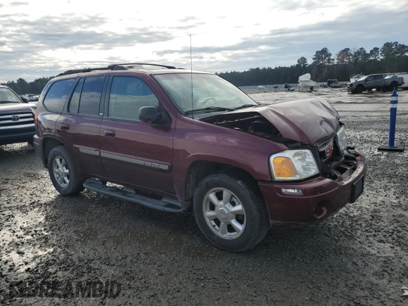 2003 GMC Envoy SLT with VIN 1GKDT13S032245485, listed as a Copart auction lot 84385304 with 139,183 mi miles and Salvage Title. Bid and sale history available at carsss.com. Image 4.