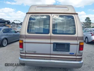1994 Ford Econoline Cargo with VIN 1FDEE14N5RHB72537, listed as a IAAI auction lot 41968893 with 245,866 mi miles. Bid and sale history available at carsss.com. Image 16.