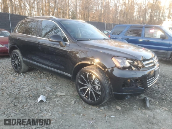 2013 Volkswagen Touareg Lux with VIN WVGEF9BP1DD001025, listed as a Copart auction lot 83784314 with 205,871 mi miles and Salvage Title. Bid and sale history available at DreamBid. Image 4.
