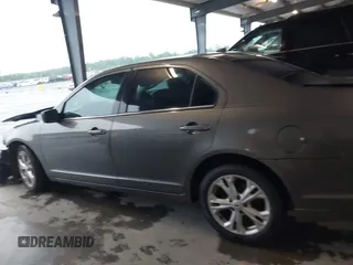 2012 Ford Fusion SE with VIN 3FAHP0HA8CR407618, listed as a IAAI auction lot 42199709 with 124,924 mi miles and . Bid and sale history available at DreamBid. Image 14.
