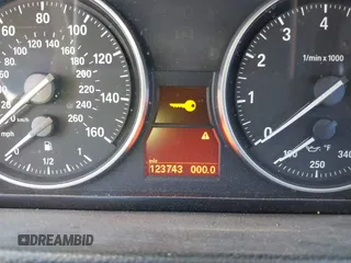 2011 BMW 3 Series 328i xDrive with VIN WBAKF5C58BE654906, listed as a IAAI auction lot 41725240 with 123,743 mi miles. Bid and sale history available at carsss.com. Image 7.