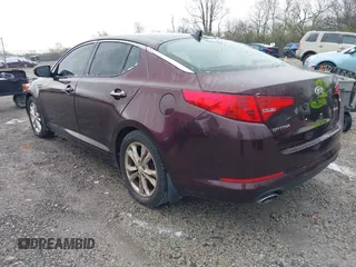 2013 Kia Optima EX with VIN 5XXGN4A74DG111397, listed as a IAAI auction lot 41977063 with 113,571 mi miles. Bid and sale history available at carsss.com. Image 3.