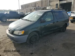 2001 Toyota Sienna LE with VIN 4T3ZF13C51U345619, listed as a Copart auction lot 71761094 with 165,000 mi miles and Salvage Title. Bid and sale history available at carsss.com. Image 1.
