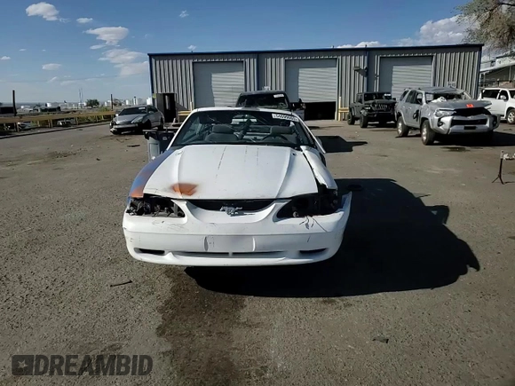 1994 Ford Mustang with VIN 1FALP45T8RF205391, listed as a Copart auction lot 54699065 with 167,335 mi miles and Salvage title. Bid and sale history available at DreamBid. Image 14.