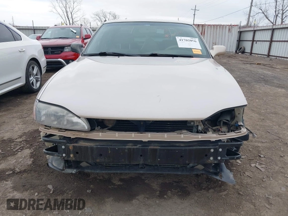 1996 Toyota Camry DX with VIN 4T1BG12K8TU738565, listed as a IAAI auction lot 41702096 with 100,587 mi miles. Bid and sale history available at carsss.com. Image 13.