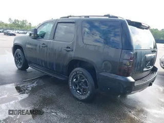 2007 Chevrolet Tahoe LTZ with VIN 1GNFC13J17J149752, listed as a IAAI auction lot 42632542 with 313,740 mi miles and . Bid and sale history available at DreamBid. Image 3.