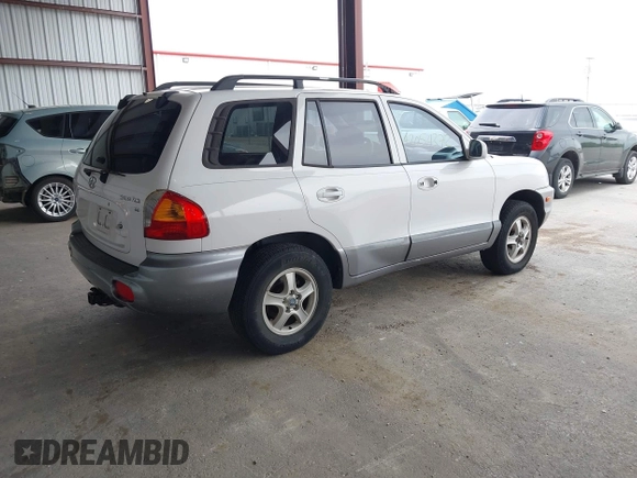 2004 Hyundai Santa Fe GLS with VIN KM8SC13D34U677767, listed as a IAAI auction lot 42054372 with 192,204 mi miles. Bid and sale history available at carsss.com. Image 4.