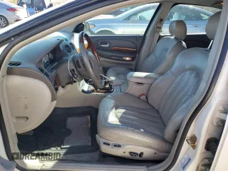 2001 Chrysler LHS z VIN 2C3AC56GX1H547856, wystawiony jako Copart lot #77842124 z przebiegiem 97 378 mil mil oraz Tytuł czysty. Historia ofert i sprzedaży dostępna na DreamBid. Obrazek 7.