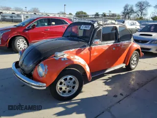 1971 Volkswagen Beetle with VIN 1112883099, listed as a Copart auction lot 87706835 with 8,087 mi miles and Salvage Title. Bid and sale history available at DreamBid. Image 1.