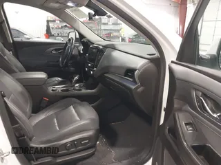 2021 Chevrolet Traverse Premier with VIN 1GNEVKKW7MJ218772, listed as a IAAI auction lot 42306743 with 106,898 mi miles and . Bid and sale history available at DreamBid. Image 5.