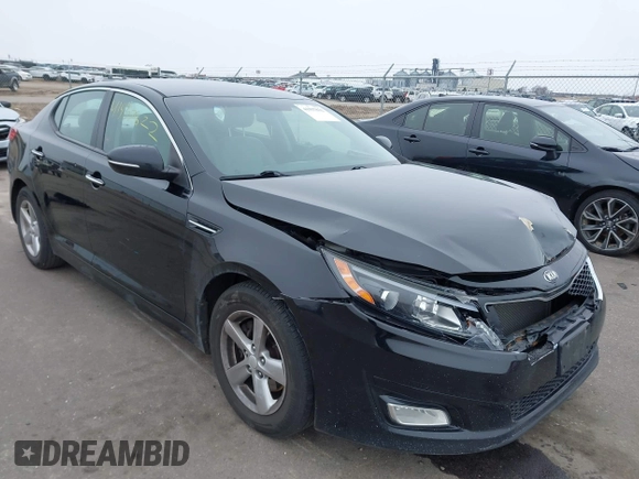 2015 Kia Optima LX with VIN 5XXGM4A7XFG388562, listed as a IAAI auction lot 41937822 with 136,764 mi miles. Bid and sale history available at carsss.com. Image 1.