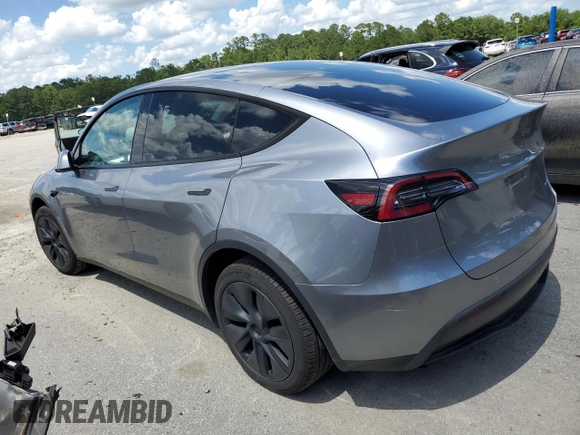 2024 Tesla Model Y Long Range z VIN 7SAYGDEE7RA308338, wystawiony jako Copart lot #61137375 z przebiegiem 19 501 mil mil oraz Szkoda całkowita • Salvage title. Historia ofert i sprzedaży dostępna na DreamBid. Obrazek 2.