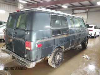 1995 Chevrolet Chevy Van z VIN 1GBEG25K2SF243949, wystawiony jako Copart lot #50422305 z przebiegiem 193 169 mil mil oraz Szkody całkowita. Historia ofert i sprzedaży dostępna na DreamBid. Obrazek 3.