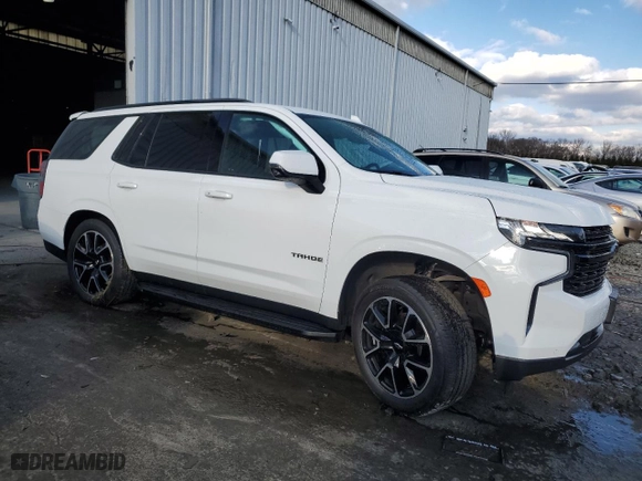 2022 Chevrolet Tahoe RST with VIN 1GNSKRKL0NR294654, listed as a Copart auction lot 82858864 with 74,410 mi miles and Salvage Title. Bid and sale history available at carsss.com. Image 4.