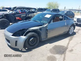 2004 Nissan 350Z Enthusiast z VIN JN1AZ34D74T164233, wystawiony jako IAAI lot #42509421 z przebiegiem 90 780 mil mil oraz . Historia ofert i sprzedaży dostępna na DreamBid. Obrazek 2.