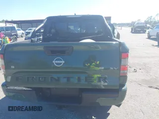 2022 Nissan Frontier SV with VIN 1N6ED1EJ2NN632457, listed as a IAAI auction lot 41694079 with 64,506 mi miles and . Bid and sale history available at DreamBid. Image 16.