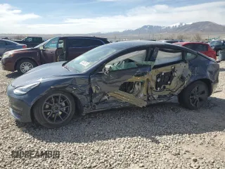 2022 Tesla Model 3 Long Range z VIN 5YJ3E1EB9NF201144, wystawiony jako Copart lot #50452025 z przebiegiem 38 761 mil mil oraz Szkoda całkowita • Salvage title. Historia ofert i sprzedaży dostępna na DreamBid. Obrazek 1.
