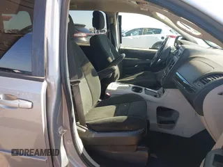 2015 Dodge Grand Caravan SXT with VIN 2C4RDGCG1FR649074, listed as a IAAI auction lot 41759409 with 116,856 mi miles and . Bid and sale history available at DreamBid. Image 5.