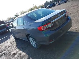 2013 Toyota Corolla L with VIN 2T1BU4EE3DC030761, listed as a IAAI auction lot 42004033 with 90,733 mi miles. Bid and sale history available at carsss.com. Image 3.