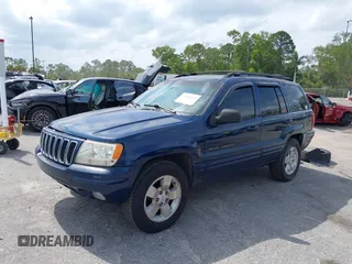 2001 Jeep Grand Cherokee Limited with VIN 1J4GX58S01C657436, listed as a IAAI auction lot 42102133 with 194,897 mi miles and . Bid and sale history available at DreamBid. Image 2.